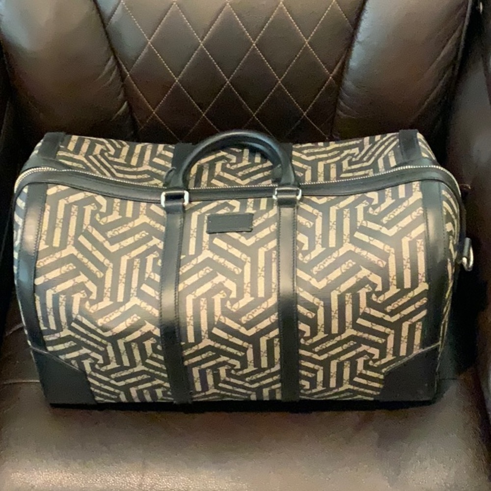 Gucci/ Goyard